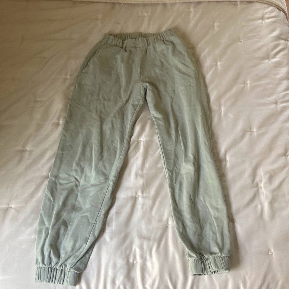 Brandy Melville John Galt Sweatpants - Color: Tea Green